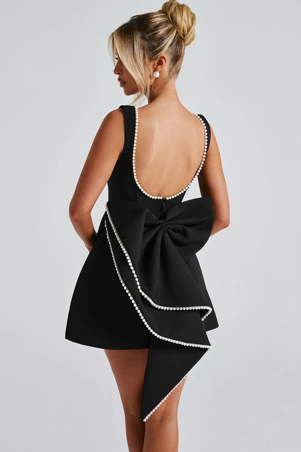 Women's A-Line Mini Dress with Pearl Trim Backless Design and Statement Bow - Image 7